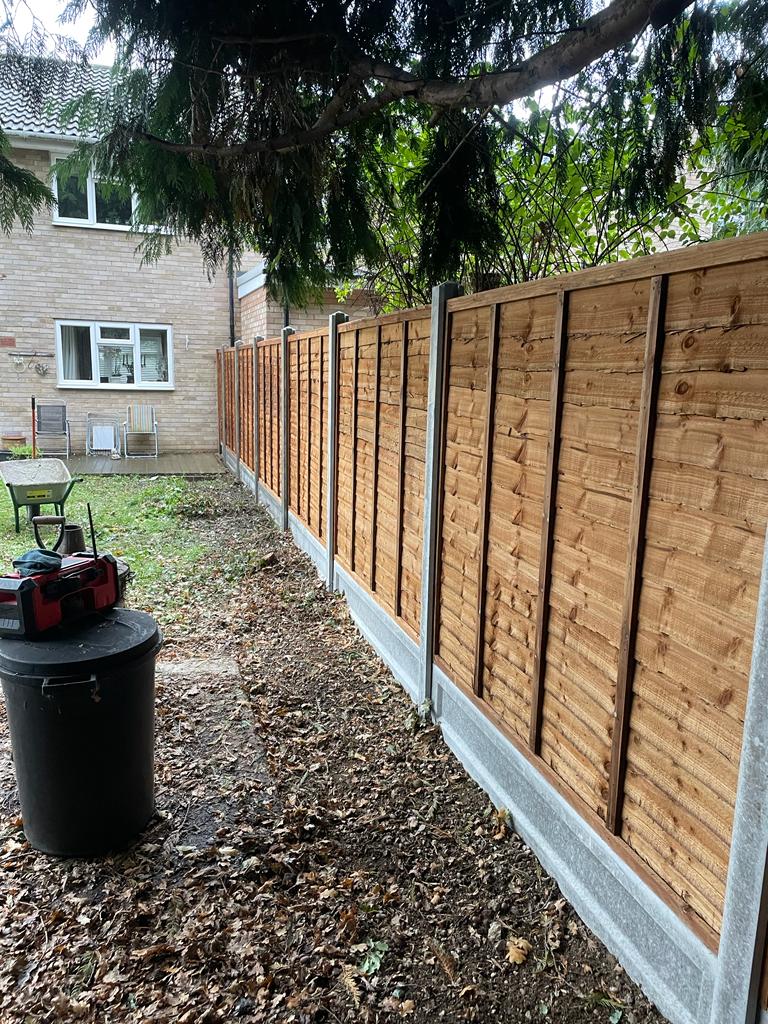 Standard overlap panels (concrete posts and concrete gravel boards)