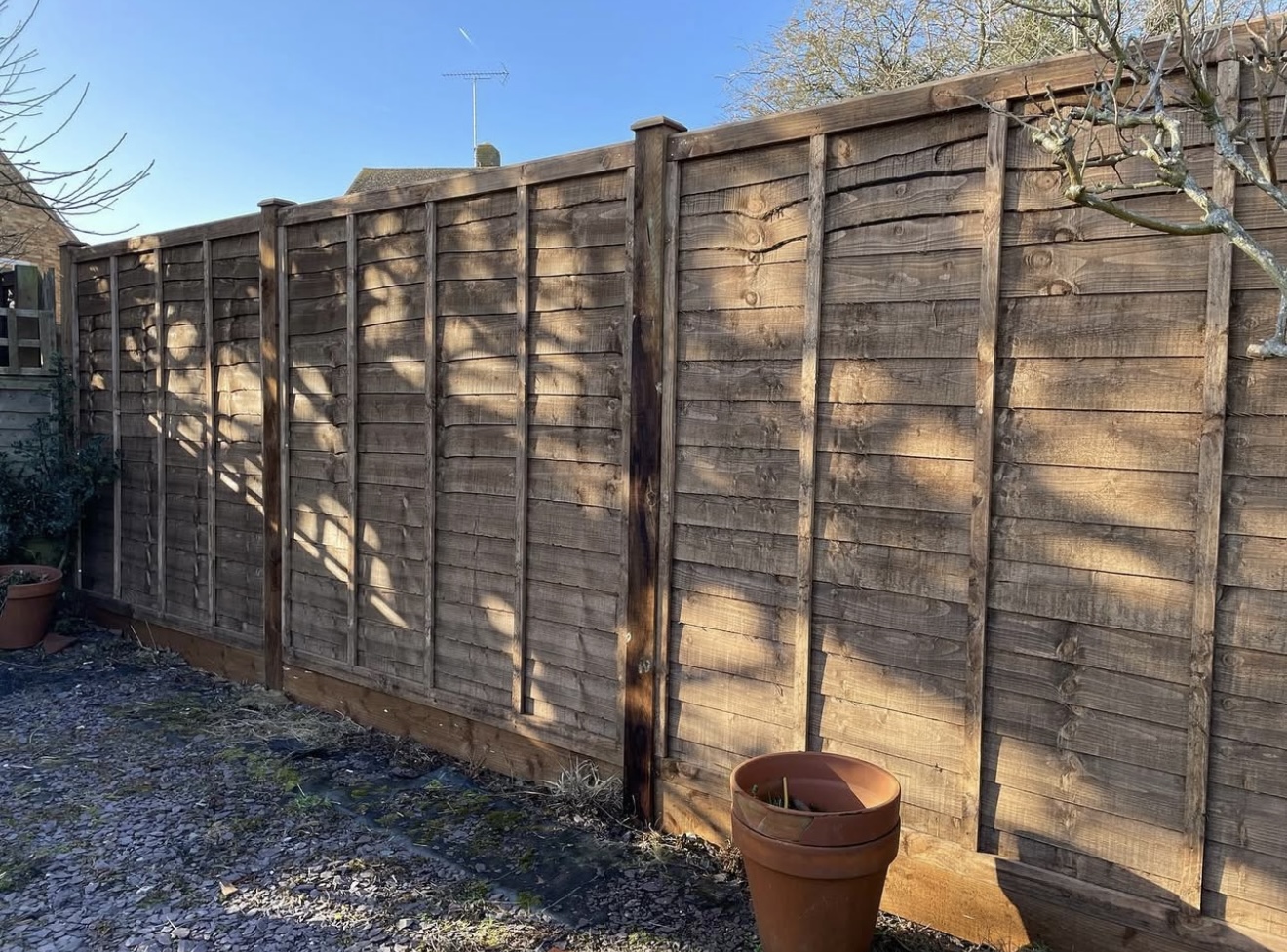Standard overlap panels (timber posts and timber gravel boards)